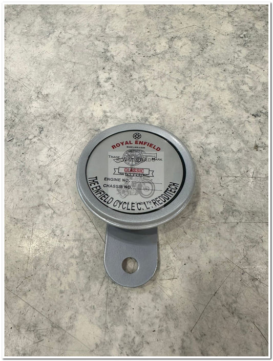 Silver tax token holder with Enfield cycle made like a gun logo in chrome fit to shocker bolt at front or rear or leg guard for Royal enfield vintage g2 1962 old model bullet 350 cast iron engine ci engine standard classic electra reborn battalion.